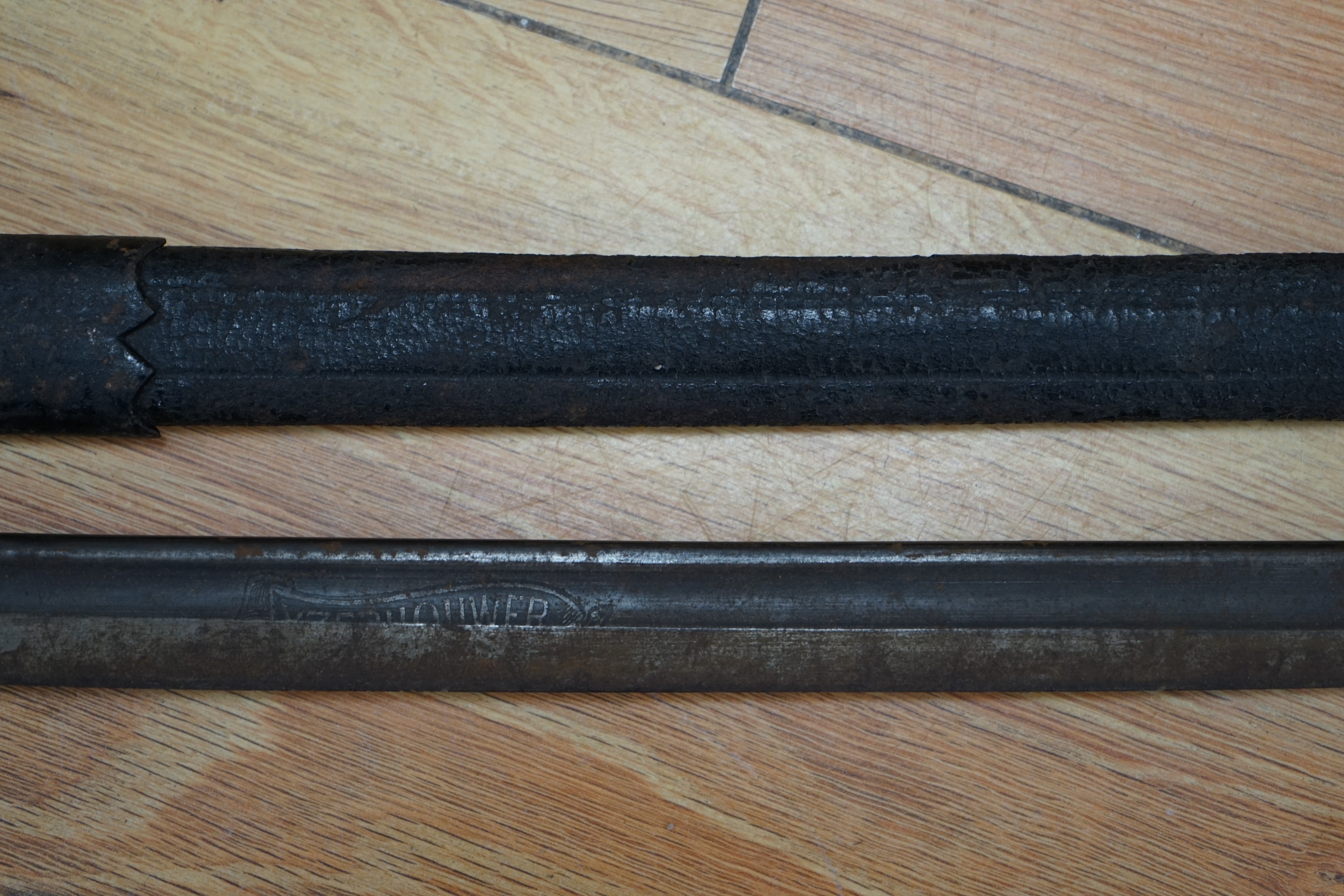 A Dutch East Indies short sword / kris having horn handle and gold inlay, another similar, a late 19th century sword and scabbard, an epee and another sword (5)